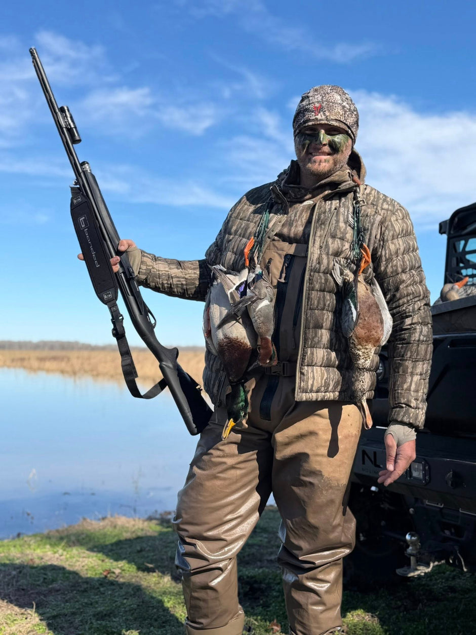 Zach Rushing wearing camo hunting outfit after duck hunting.