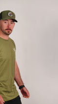 Load and play video in Gallery viewer, Military Green Circle Logo Tee
